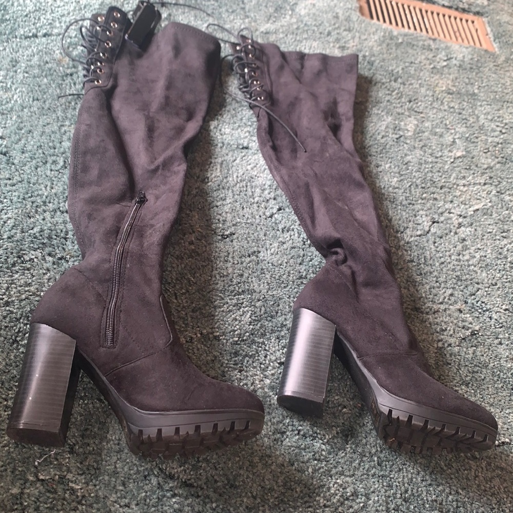 Black thigh high black boot